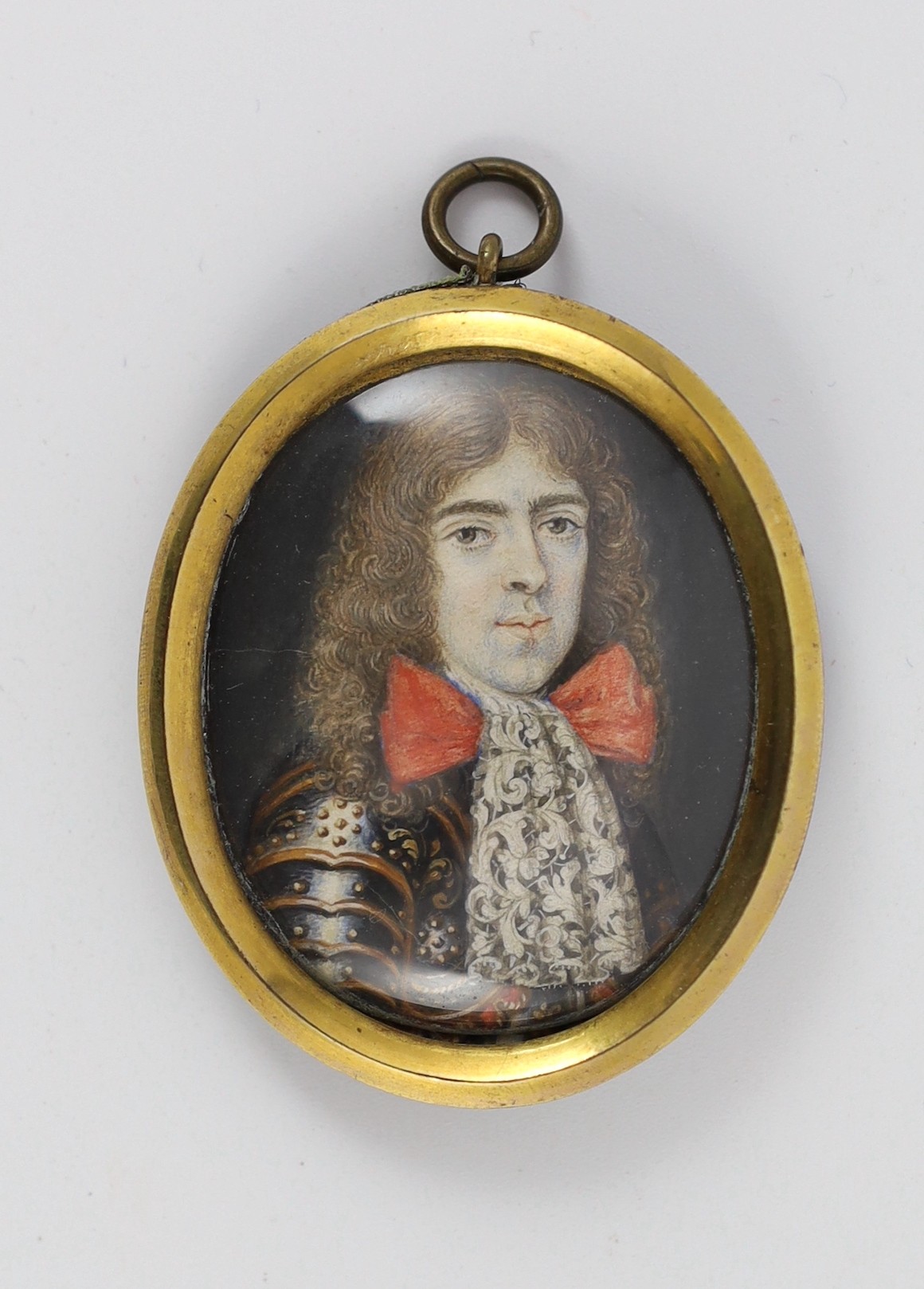 Manner of Pierre Huaut (Swiss, 1647-1698), Portrait miniature of a gentleman wearing armour, watercolour on ivory, 4.5 x 3.25cm